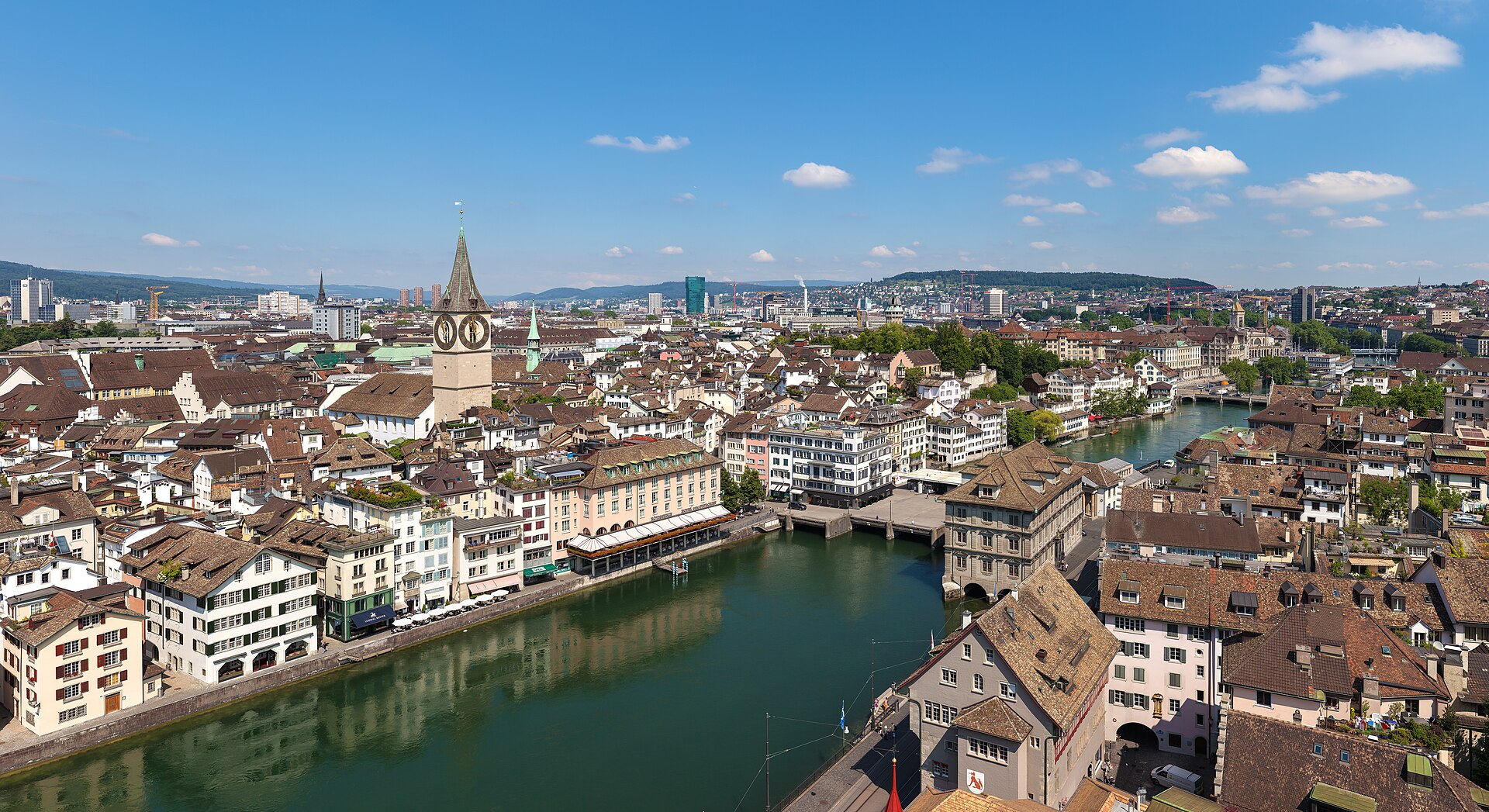 Zurich skyline with lake and mountains
